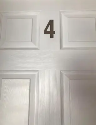 a door with the number four on it at Apartment 4, 1 Laura Place in Aberystwyth