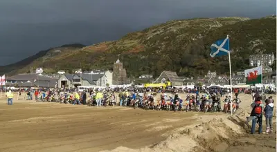 a large group of people riding bikes on a beach at 3 Park View in Barmouth