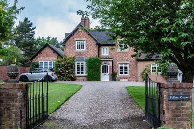 a house with a car parked in front of it at Pelham Grove in Shrewsbury