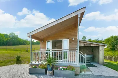 a tiny house with a porch and a balcony at 1 Bed in Lower Chapel oc-waa396 in Lower Chapel