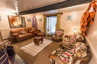 an overhead view of a living room with couches at Gwesty Minffordd Hotel in Tal-y-llyn