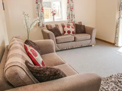 a living room with a couch and two couches at The Boundary Annex in Bishops Castle