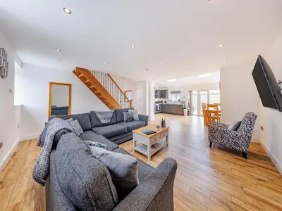 a living room with a couch and a table at Ty Felin - Uk12744 in Acrefair