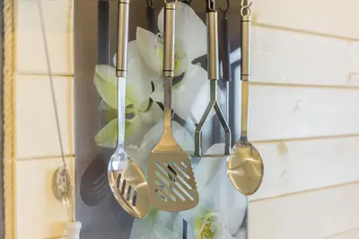 a group of utensils hanging from a wall at Stiperstones Pod in Shrewsbury