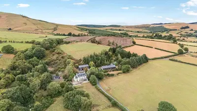 an aerial view of a house in a field at Hillside View in Rhayader