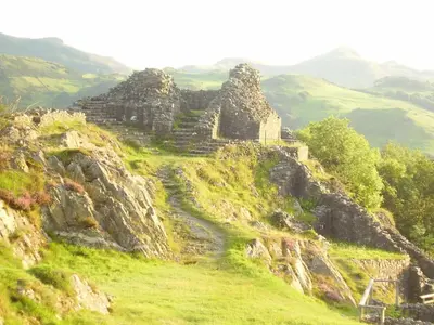 an old building on the side of a mountain at The Dolgoch in Bryn-crug