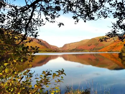 a view of a lake with mountains in the background at Pen-Y-Bont Hotel in Tal-y-llyn