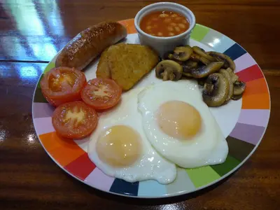 a colorful plate of eggs and mushrooms and beans at Borthwnog Hall in Dolgellau