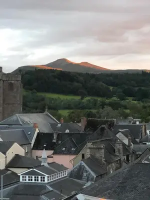 a view of a town with mountains in the background at Mount Street House in Brecon