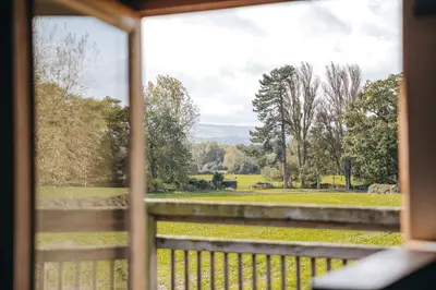 a view from a window of a park at the garden room in Shrewsbury