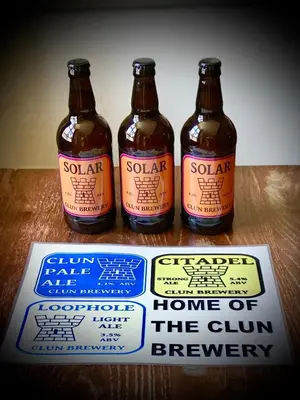 three bottles of beer on top of a box at The White Horse Inn, Clun in Clun