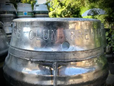 a metal drum with the words the onion brewery written on it at The White Horse Inn, Clun in Clun