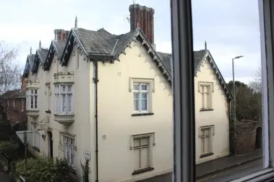 a view of a white house from a window at 4BedHouse Leominster Hiking Castles Sleeps7 Wifi in Leominster