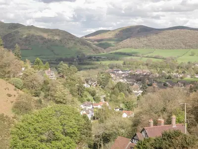a small town in a valley with mountains at The Wheelhouse at Dudgeley Mill in Church Stretton