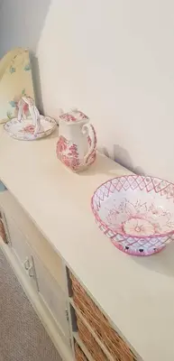 a white counter with two plates on top of it at Lavender Cottage in Presteigne