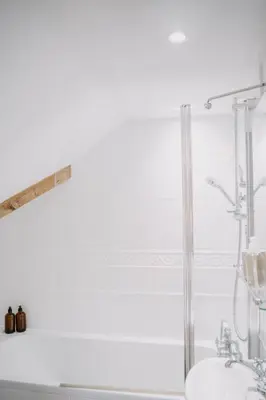 a bathroom with a shower and a sink at Three Cocks Hotel in Brecon