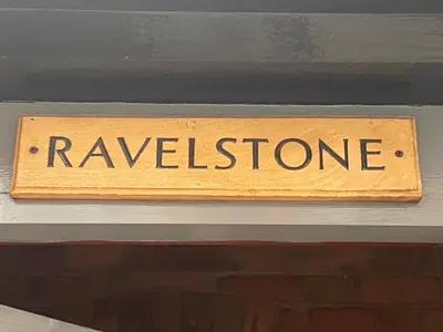 a wooden sign that says relaxation on top of a door at Ravelstone in Church Stretton