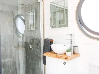 a bathroom with a sink and a shower at Cherry Blossom in Craven Arms