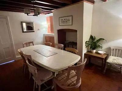 a dining room with a table and chairs at Avondale in Llangollen
