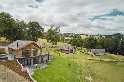 an aerial view of a house with a large yard at Shepherds Rest in Llandyssil