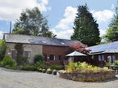 a house with a garden in front of it at Jinney Ring in Leintwardine