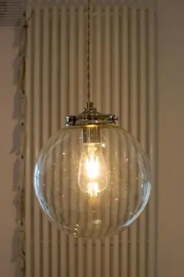 a glass light fixture hanging from a chain at 2 Bed in Aberystwyth oc-bow200 in Aberystwyth