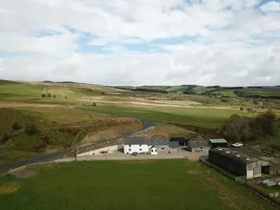 an aerial view of a farm in a field at 4 Bed in Welshpool oc-wab267 in Welshpool