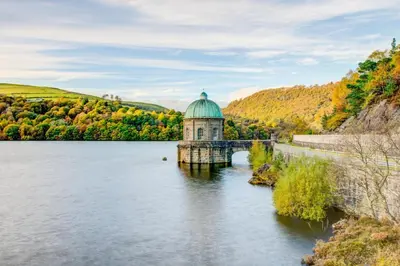 a building on a bridge over a body of water at 4 Bed in Welshpool oc-wab267 in Welshpool