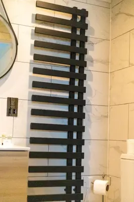 a rendering of a piano on a wall in a bathroom at Ty Belgrave - Apartment 3 in Aberystwyth
