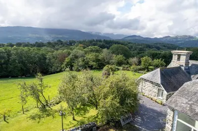 an aerial view of a house in a field at 1 Bed in Dolgellau oc-bow292 in Dolgellau