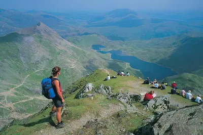 a person standing on top of a mountain at 1 Bed in Dolgellau oc-bow292 in Dolgellau