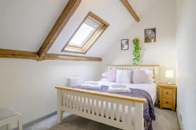 a bedroom with a bed and a skylight at 2 Bed in Cray oc-bow287 in Cray