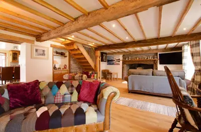 a living room with a couch and a tv at 4 Bed in Cray oc-bow288 in Cray