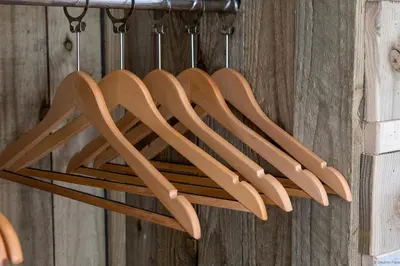 a bunch of knives hanging on a wall at Cozy Log Burner Cottage & On-Site Dog Field in Bryn-crug