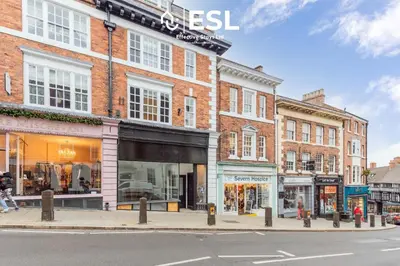 a group of buildings on a city street at Studio 3, Top Floor Town Centre Apartment in Shrewsbury