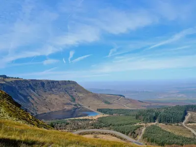a view of a valley with a lake on a mountain at Ty Olwyn Bach - Uk36418 in Talybont