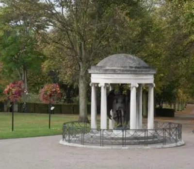 a gazebo with a statue in a park at NiCheGetaway in Shrewsbury