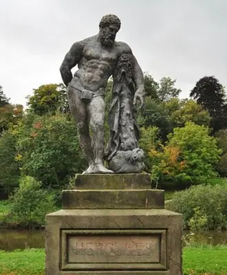 a statue of a man standing in a park at NiCheGetaway in Shrewsbury