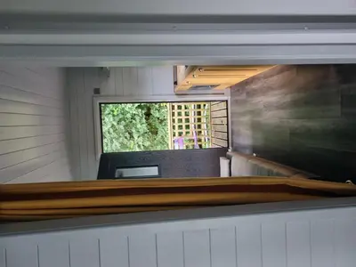a view from the back of a room with a window at Glamping Hut - Riverview 3 in Welshpool