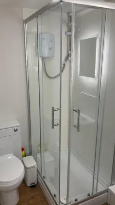 a bathroom with a shower and a toilet at The Garden House in Shrewsbury