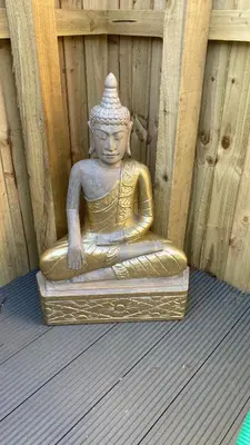 a gold statue of aitatingitatingitatingitatingitatingitatingitatingitatingfficient at The Garden House in Shrewsbury