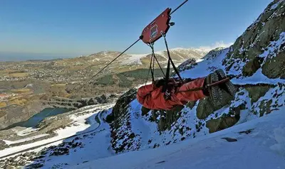 a red object is hanging from a mountain at 2 Bed in Dolgellau oc-bow282 in Trawsfynydd