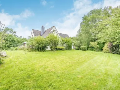 a house with a large yard with green grass at Cwmfron House in Llanidloes