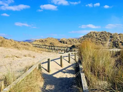 a dirt path in the sand in the desert at Tir Gafr in Harlech