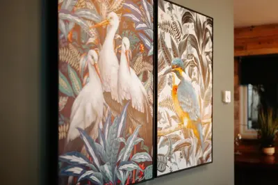 a painting of four birds on a wall at Boutique Shrewsbury Suites in Shrewsbury