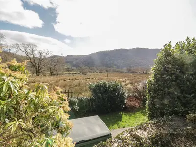a view of a field from the garden of a house at The Old Smithy Cottage in Blaenau-Ffestiniog