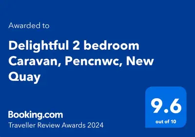 a screenshot of a cell phone with the text upgraded to platinum bedroom caranyon at Delightful 2 bedroom Caravan, Pencnwc, New Quay in Cross Inn