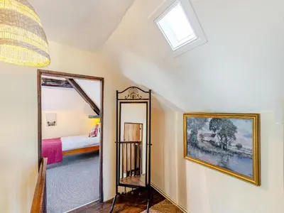 a room with a mirror and a bed at The Cottage-Uk37339 in Montgomery