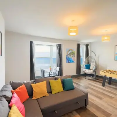 Seafront apartment with balcony