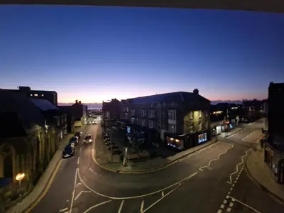 a view of a city street at night at Luxury 4 Bedroom Seaside Apartment - Glan Y Werydd House in Barmouth